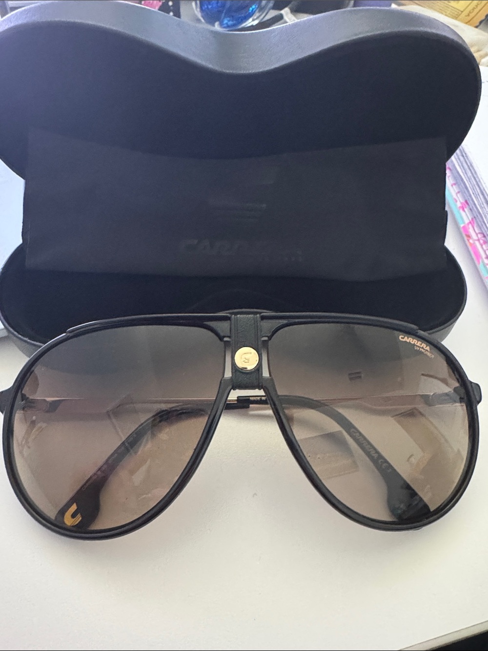 Carrera Black Frame Sunglasses with gold arms, logo hard case and clean cloth